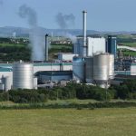Wind farm turbines in open landscape